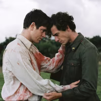 An analog film still from La Bola Negra.