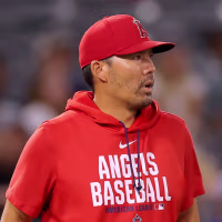 ANAHEIM, CALIFORNIA - AUGUST 10: Manager Kurt Suzuki #8 of the Los Angeles Angels looks on during the tenth inning against the Texas Rangers at Angel Stadium of Anaheim on August 10, 2026 in Anaheim, California. (Photo by Katelyn Mulcahy/Getty Images)