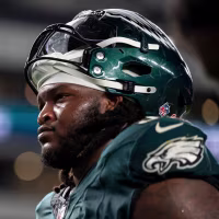 PHILADELPHIA, PENNSYLVANIA - SEPTEMBER 13: Jalen Carter #98 of the Philadelphia Eagles looks on as he walks off the field against the Washington Commanders following an NFL football game at Lincoln Financial Field on September 13, 2026 in Philadelphia, Pennsylvania. (Photo by Michael Owens/Getty Images)