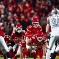 KANSAS CITY, MISSOURI - NOVEMBER 29: Patrick Mahomes #15 of the Kansas City Chiefs prepares for the snap from Creed Humphrey #52 during the second half against the Las Vegas Raiders at GEHA Field at Arrowhead Stadium on November 29, 2024 in Kansas City, Missouri. (Photo by Aaron M. Sprecher/Getty Images)