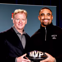 NEW ORLEANS, LA - FEBRUARY 10: NFL commissioner Roger Goodell and Quarterback Jalen Hurts #1 of the Philadelphia Eagles pose after being presented the Pete Rozelle Trophy as Super Bowl LIX Most Valuable Players during the Super Bowl Winning Team Head Coach and MVP Press Conference inside of the Ernest N. Morial Convention Center on February 10, 2025 in New Orleans, Louisiana. The Eagles defeated the Kansas City Chiefs to earn their second Super Bowl win 40-22. (Photo by Don Juan Moore/Getty Images)