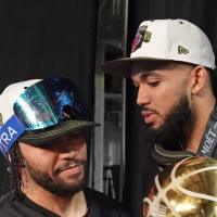 SAN ANTONIO, TX - JUNE 13:  Jalen Brunson #11 and Karl-Anthony Towns #32 of the New York Knicks pose with the Larry O'Brien Championship Trophy after the game against the San Antonio Spurs during Game Five of the 2026 NBA Finals on June 13, 2026 at Frost Bank Center in San Antonio, Texas. NOTE TO USER: User expressly acknowledges and agrees that, by downloading and or using this photograph, User is consenting to the terms and conditions of the Getty Images License Agreement. Mandatory Copyright Notice: Copyright 2026 NBAE(Photo by Jesse D. Garrabrant /NBAE via Getty Images)