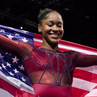 Two years after an Achilles tear, Skye Blakely claimed her first individual medal at gymnastics worlds by winning the women's all-around with a total of 55.733 points