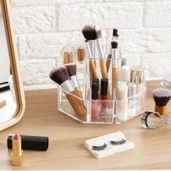 Makeup cosmetic products and tools on dressing table, with an acrylic lazy Susan organizer. Best makeup organizers and storage ideas, including acrylic makeup organizers from Amazon, Walmart, Target, iDesign, The Container Store and more.