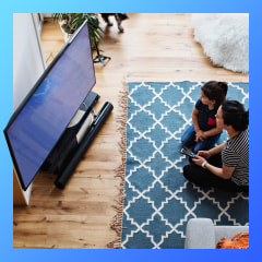 mother and daughter watching tv in living room. See the best TV brands to try in 2021. Shop top TV brands including the Samsung Q90A QLED TV, LG CX OLED TV, TCL Class 5 Series and more.