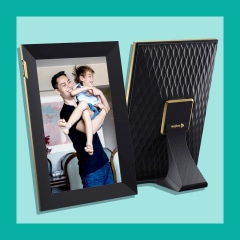 Image of a touchscreen Nixplay Picture Frame and a woman using the touchscreen picture frame. Check out the Nixplay 10.1-inch digital smart photo touchscreen frame. See how the new frame can still be controlled through the Nixplay app, your phone and more
