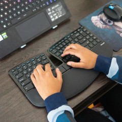 Writer Rebecca Isaacs using her Microsoft Sculpt Keyboard
