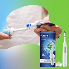 Oral-B Pro 1000 Power Rechargeable Electric Toothbrush and person applying toothpaste