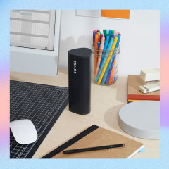Illustration of a Sonos speaker on a work desk, an Ember Mug and a plant box