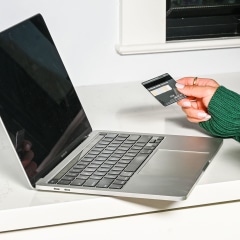 Woman on her credit card shopping online