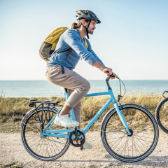 Woman and man biking on the beach, wearing helmets. Shop the best bike helmets of 2021 and learn how to choose the best bike helmet for you. See bike helmets from Schwinn, Cannondale, Giro, ABUS and more.