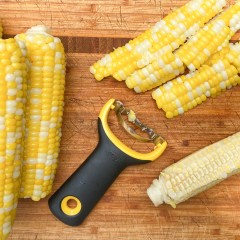 Split image of a hand using a corn peeler ode and a plate of corn and food