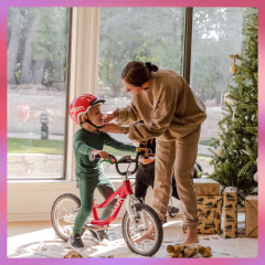 Two kids riding on bikes