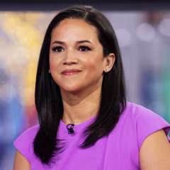 Laura Jarrett in a pink dress on the Today Show.