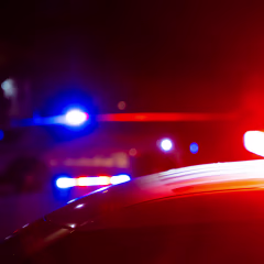 Police flashing lights at crime scene