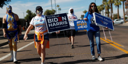 Image: People promote the importance of the Latino vote in Maryvale, Phoenix