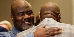 Image: Rodney Floyd embraces Philonise Floyd during a news conference following the verdict in the trial of Derek Chauvin