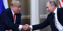 Vladimir Putin and Donald Trump shake hands before a meeting in Helsinki, Finland on July 16, 2018.