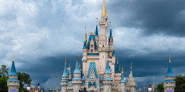 The Cinderella Castle during an overcast day is seen in the Walt Disney's Magic Kingdom theme park. The park is a famous place and tourist attraction. (Photo by Roberto Machado Noa/LightRocket via Getty Images)