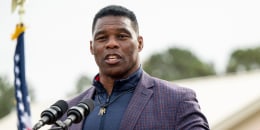 Senate candidate Herschel Walker speaks to supporters at a campaign rally