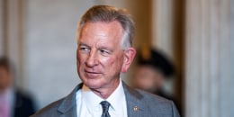 Tommy Tuberville, R-Ala., speaks to reporters outside the Senate chamber in the Capitol on July 13, 2023.