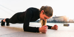 Young woman in plank position