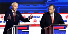 Former Gov. Asa Hutchinson and former Governor Chris Christie during the Republican Presidential primary debate