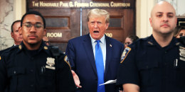 Donald Trump speaks while the court takes a lunch recess during the first day of his civil fraud trial at New York State Supreme Court on Oct. 2, 2023.