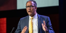 Former Rep. Will Hurd speaks onstage at a podium