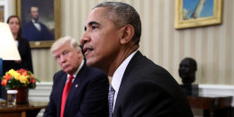 Then President-elect Donald Trump watches and then-President Barack Obama as he addresses reporters