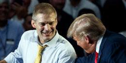 Rep. Jim Jordan, R-Ohio, looks to President Donald Trump as he speaks at a rally