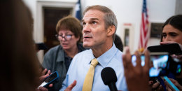 Reporters surround Rep. Jim Jordan as he leaves a House Republican caucus meeting