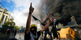 Protesters chant slogans during a demonstration in solidarity with Palestinians in Gaza, near the U.S. embassy in Beirut.