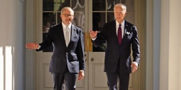 Australian Prime Minister Anthony Albanese and President Joe Biden walk down the colonnade to the Oval Office