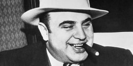 Al Capone on the train which carried him to federal prison.