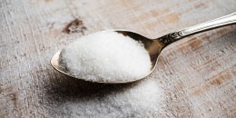 Artificial Sweeteners and Sugar Substitutes in metal spoon. 