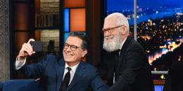 Stephen Colbert and guest David Letterman take a selfie.