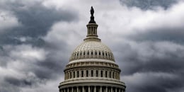 Storm clouds pass over the Capitol in January.