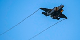 An Israeli air force F-35 flies over during a graduation ceremony for new pilots on June 29, 2023.