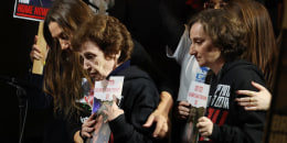 Former Russian-Israeli hostages Irena Tati, left, and her daughter Yelena Tropanov, right, during a demonstration in Tel Aviv on Dec. 2, 2023, for the release of Israeli hostages held in Gaza since the October 7 attacks.