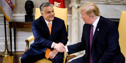 Hungary's Prime Minister Viktor Orban (L) and former US President Donald Trump shake hands in Washington, DC. on May 13, 2019. 