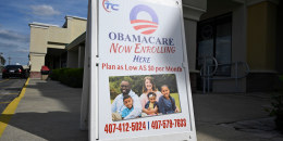 A sign advertising Obamacare health insurance enrollment on March 12, 2024, in Orlando, Fla. 