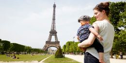 Mom and baby in front of Eiffel Tower in Paris