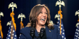 Kamala Harris  smiles on stage