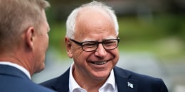 Minnesota Gov. Tim Walz arrives  at City Hall on Aug. 1, 2024 in Bloomington, Minn.
