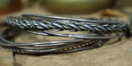 Close up of some vintage metal bracelets