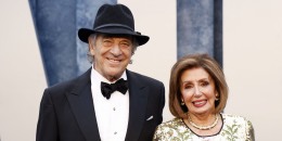 Nancy Pelosi and her husband Paul Pelosi smiling at the Vanity Fair Party in 2023