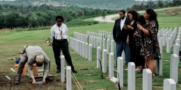 Victor Honey's family attends a burial service.