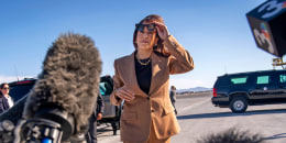 Vice President Kamala Harris walks toward reporters to speak before boarding Air Force Two on Oct. 10, 2024, in Las Vegas.