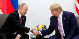  Russian President Vladimir Putin shakes then US President Donald Trump's hand in Osaka, Japan on June 28, 2019.